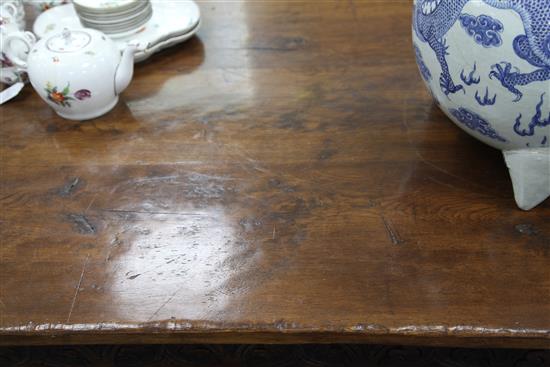 A large carved oak refectory table, 11ft 8in. x 2ft 11.5in. x 2ft 6.5in.